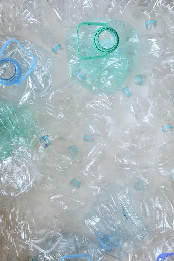 a large pile of plastic bottles